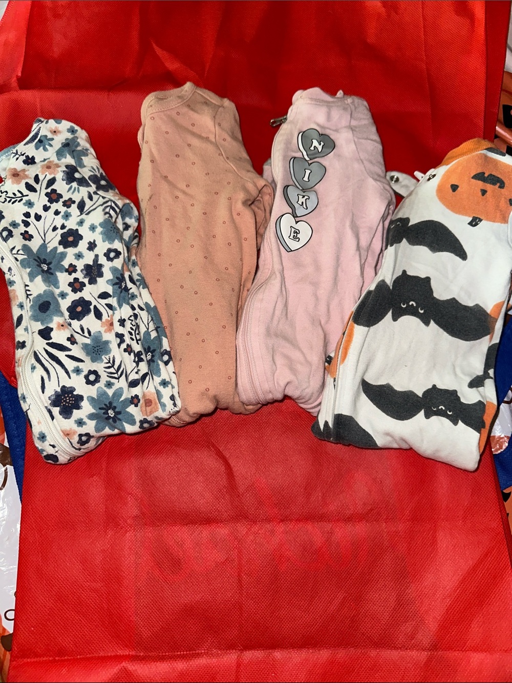 Lot of 4 Footie pajamas Carters and Nike